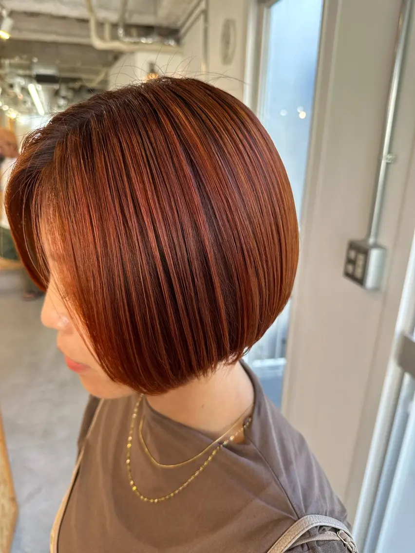 ショート カラー オレンジ ヘアカラー 松本 莉央のヘアスタイル