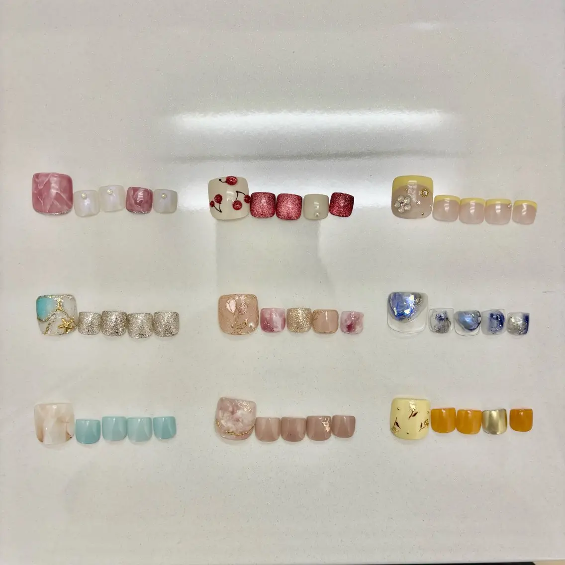 【オフ無】フットデザインネイル🎀💅🏻🪽🫧の写真