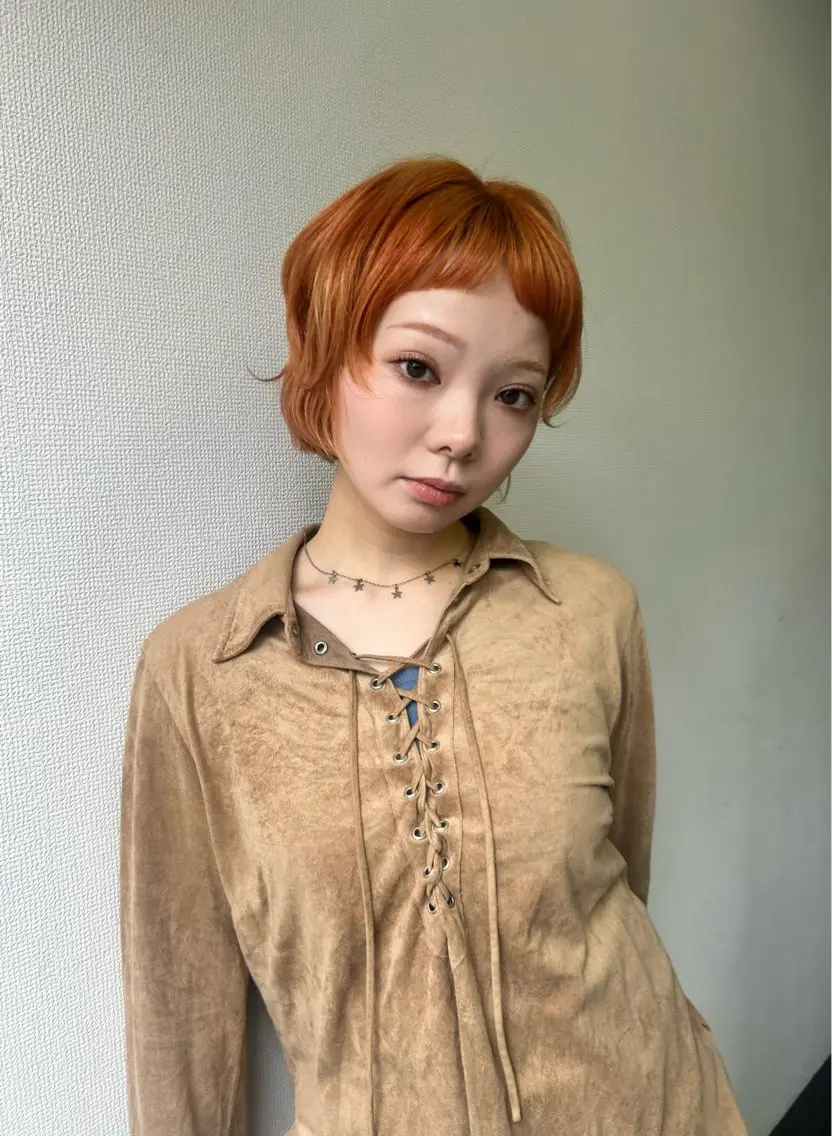 ショート カラー オレンジ ヘアカラー chico .のヘアスタイル