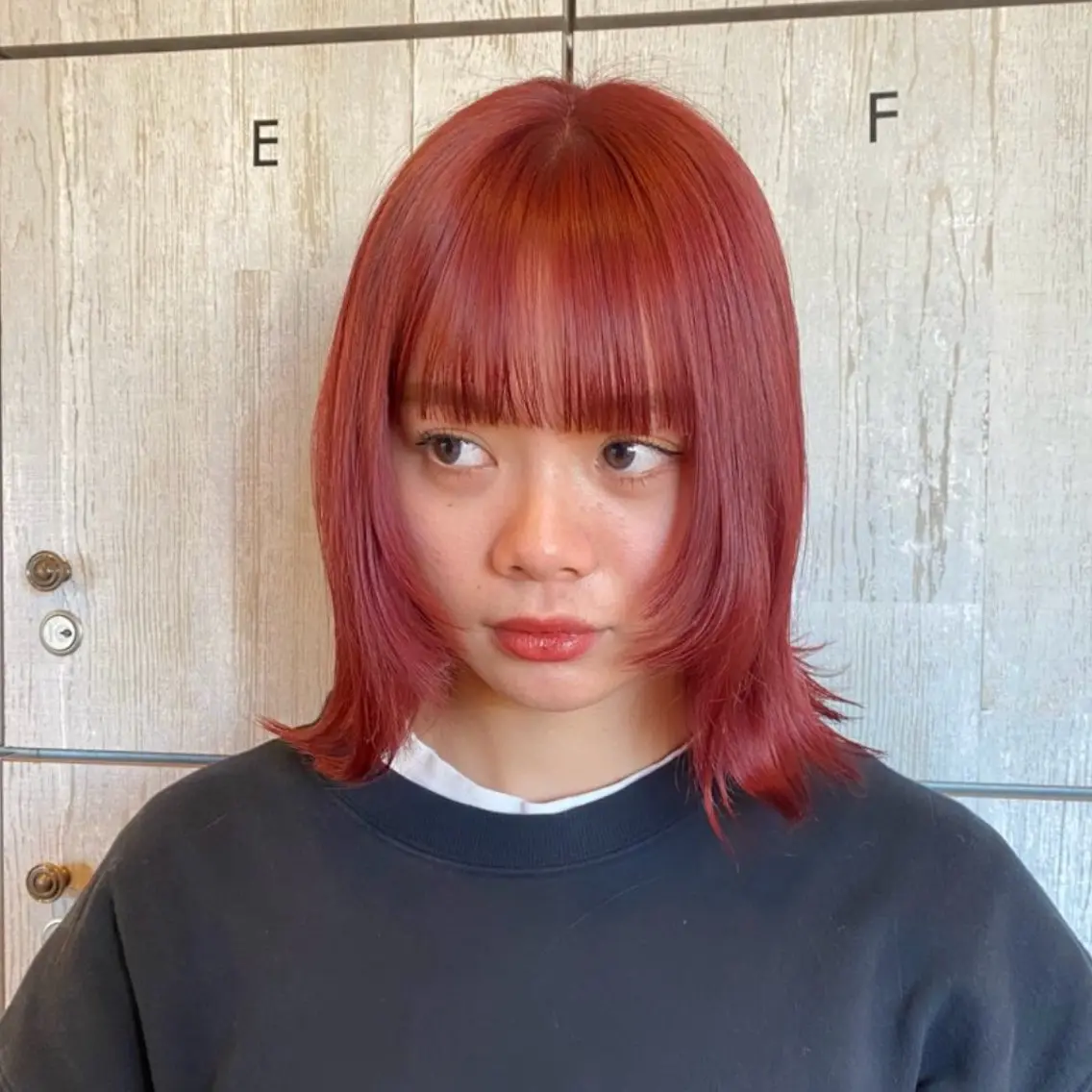 ショート カラー ブリーチ レッドカラー ボブ 顔まわりレイヤー 顔周りカット .5 by soleil 小松店のヘアスタイル