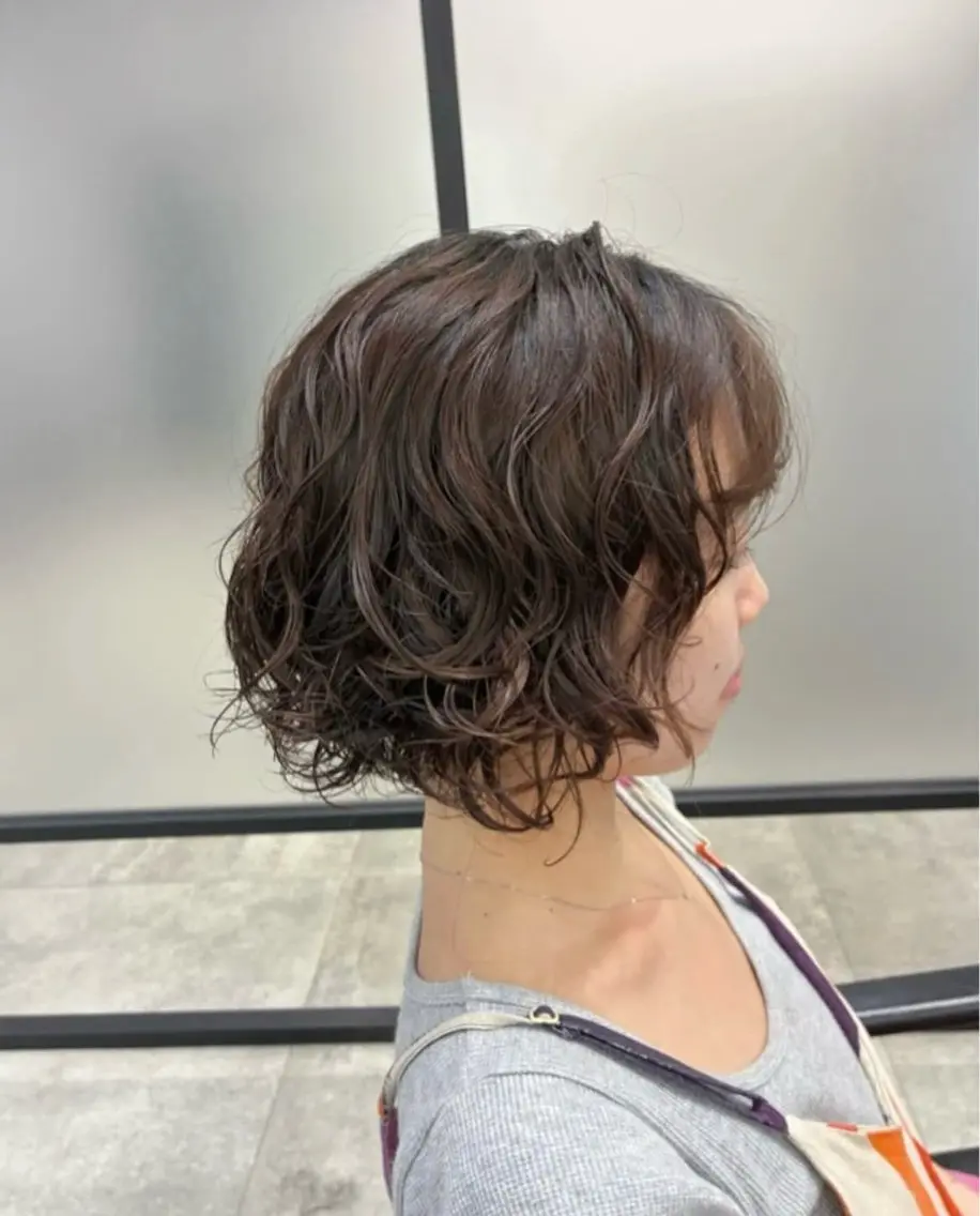 似合わせカット + くせ毛風パーマの写真