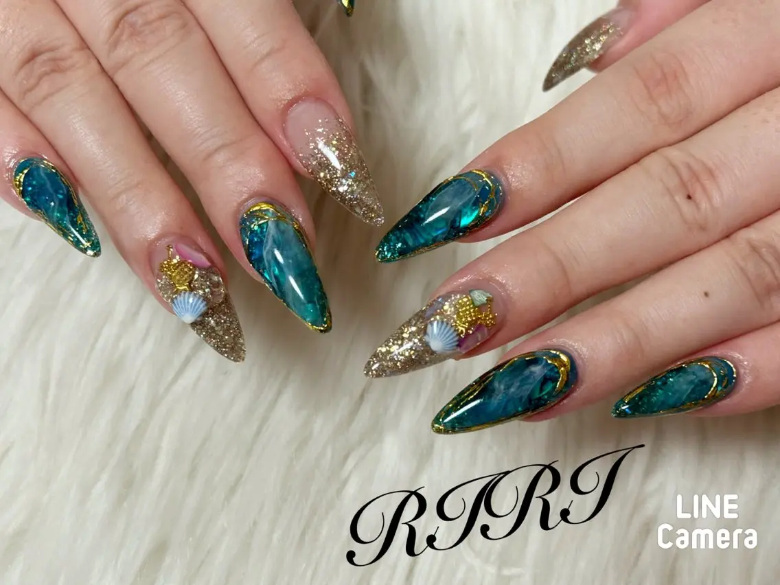 ネイル ブルー ジェルネイル ラメ(グリッター) ロングネイル スカルプネイル riri オーナーのネイルデザイン