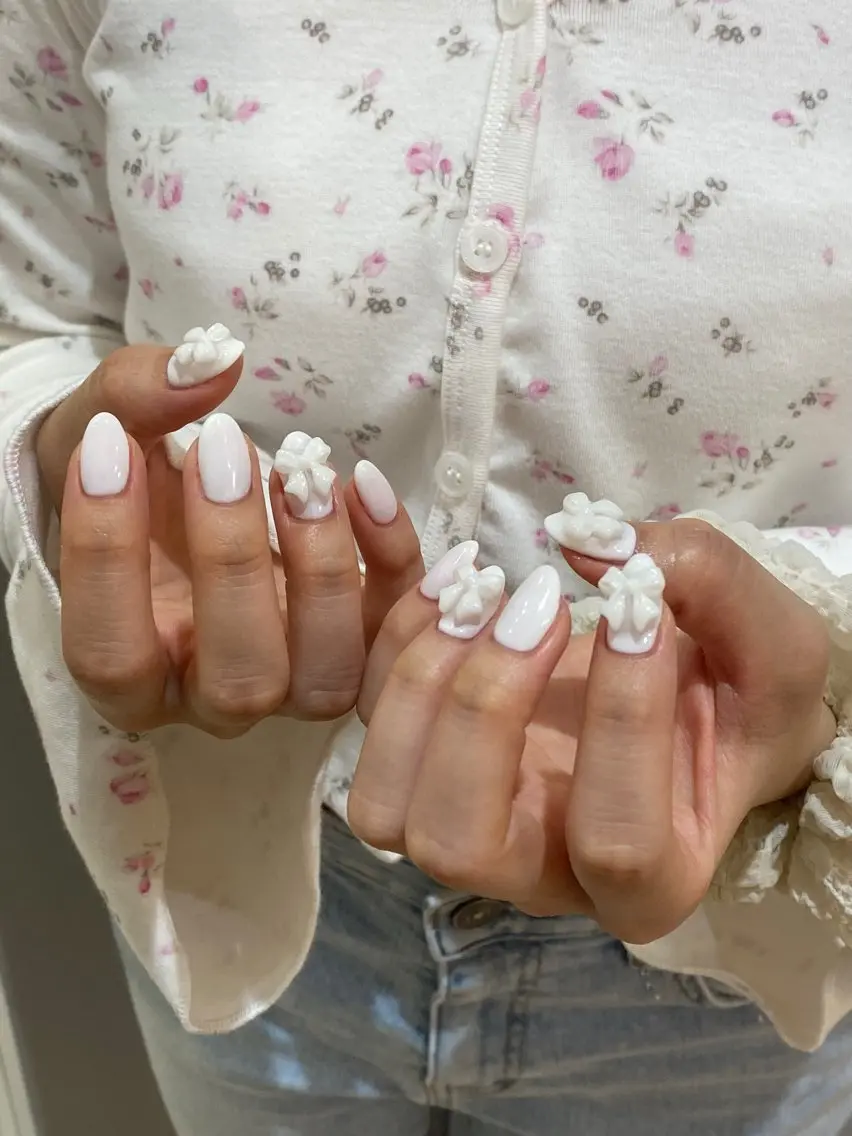 ネイル ワンカラーネイル リボン CLALA Yuri🩶のネイルデザイン