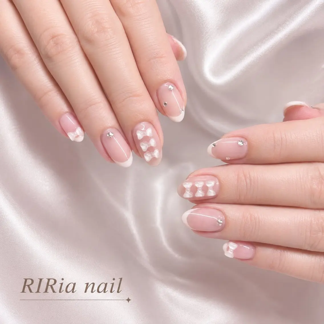 ネイル フレンチネイル ガーリー ぷっくりネイル リボン ホワイト ハンドネイル 🎀RIRia nail🎀のネイルデザイン