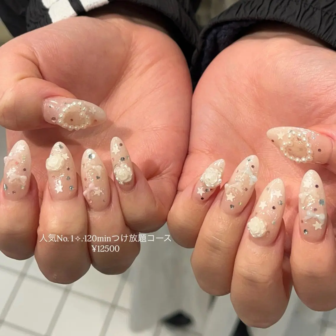 ネイル キラキラネイル ロングネイル リボン 冬ネイル ハンドネイル 横浜Nailist 𝜗𝜚春菜のネイルデザイン