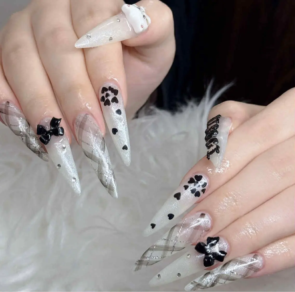 ネイル ロングネイル マグネットネイル リボン 夏ネイル スーパーロングネイル Hani Nail Salonのネイルデザイン