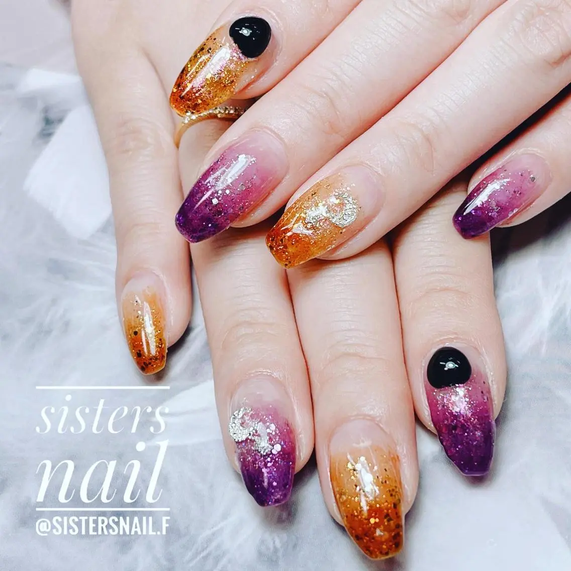 ネイル アートネイル ハロウィン ホログラムネイル キラキラネイル オレンジ sisters nail.fのネイルデザイン