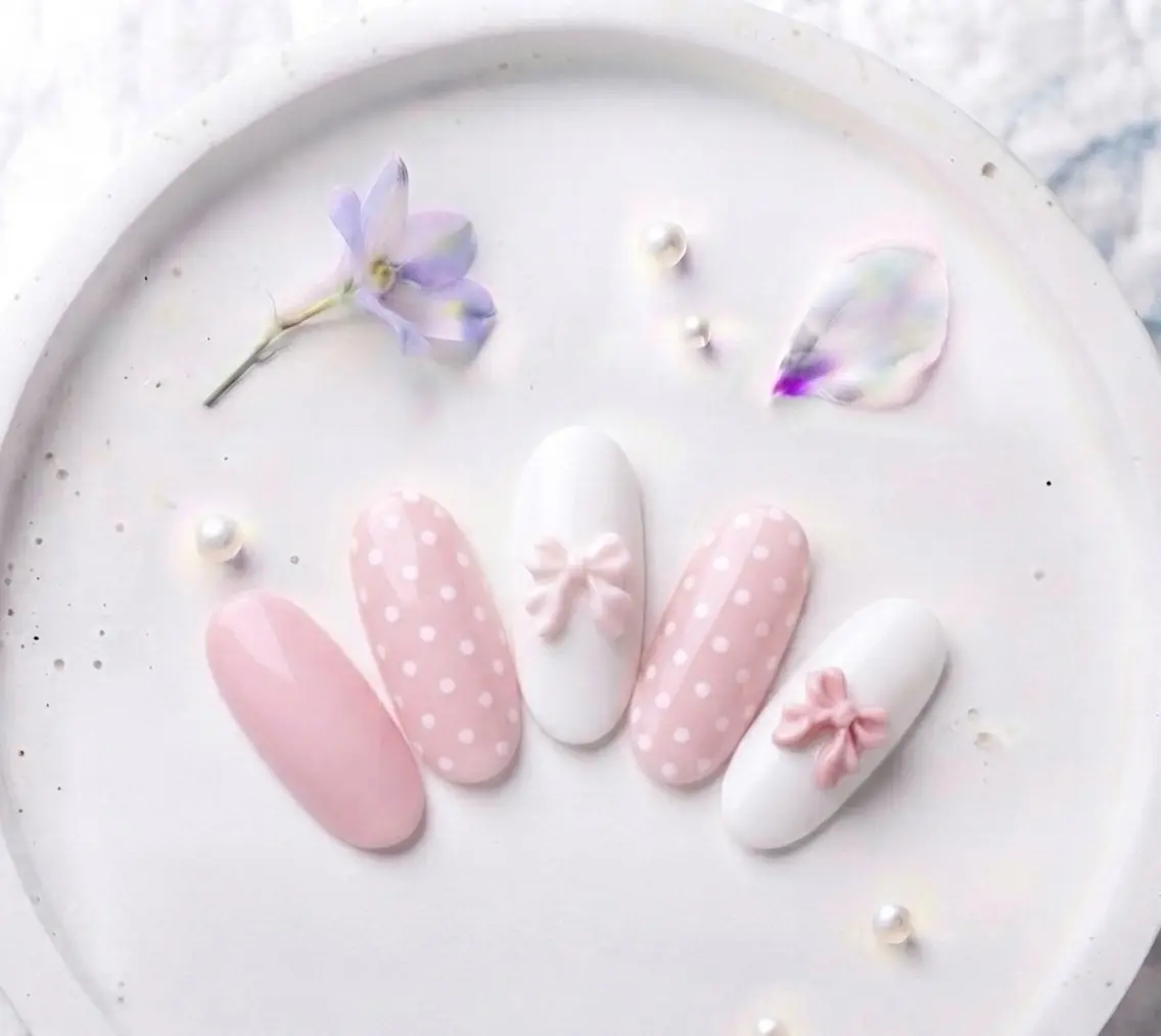 ネイル ドット パステルネイル ピンク リボン ネイルチップ Michan Nailのネイルデザイン