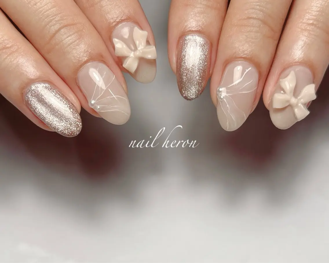 ネイル リボン ハンドネイル saki_ nail heronのネイルデザイン
