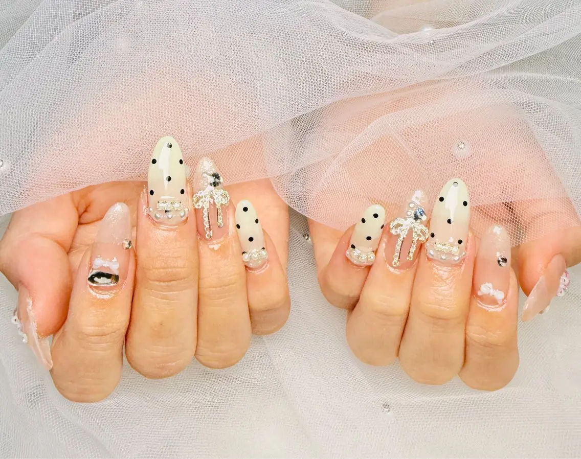 ネイル ドット リボン ハンドネイル Reauty Nailのネイルデザイン