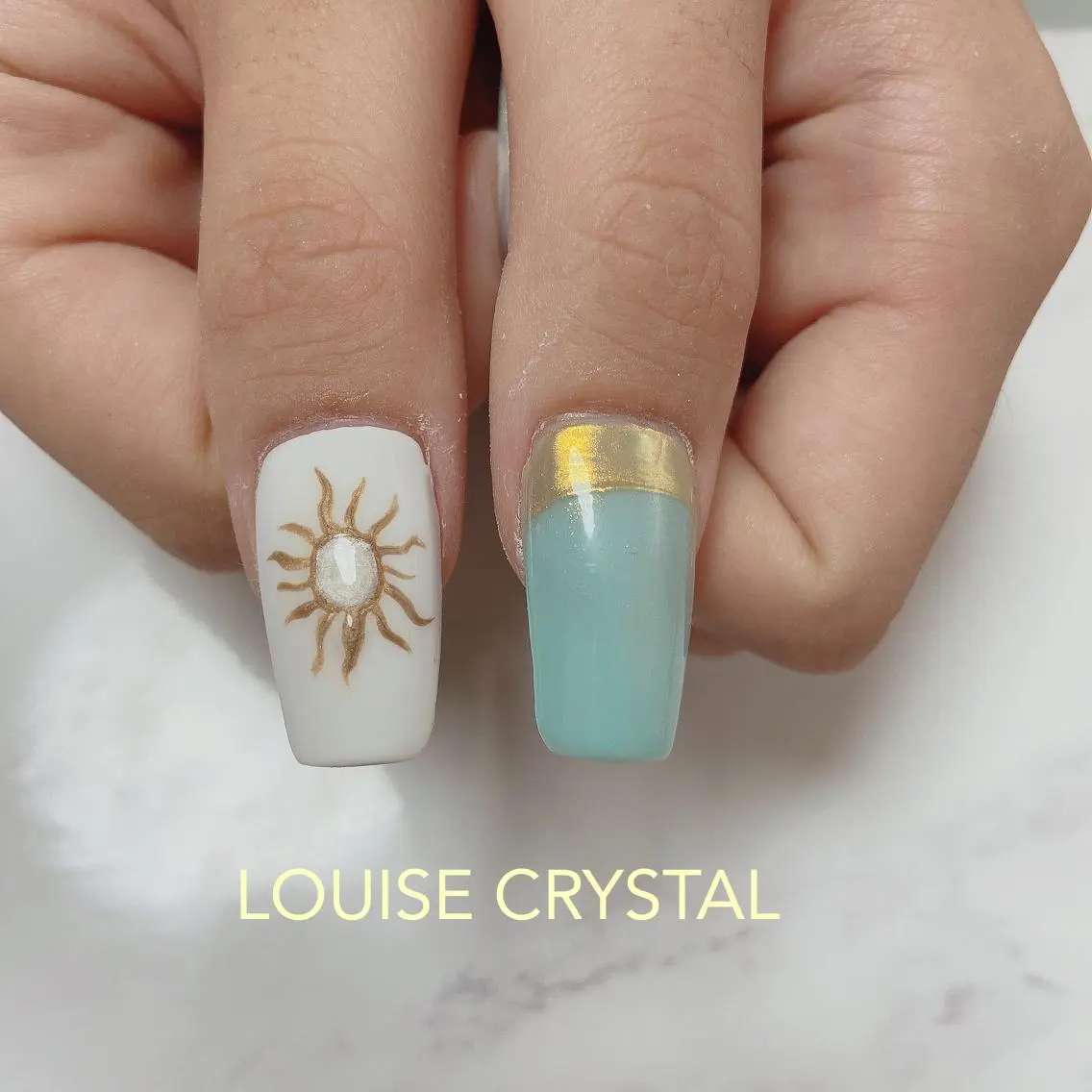 ネイル ハンドネイル LOUISE CRYSTALのネイルデザイン