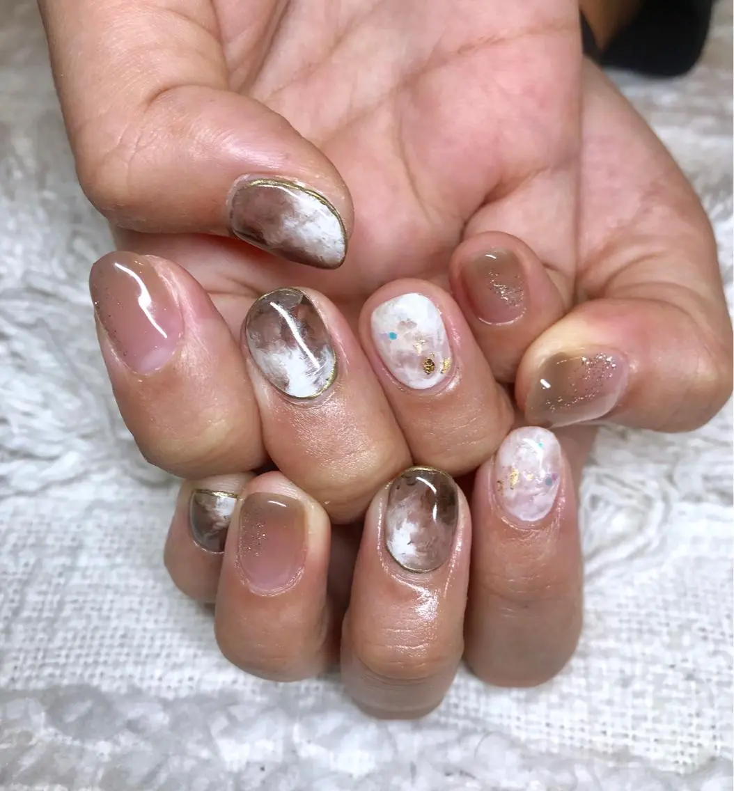 ショート カラー パーマ ヘアアレンジ ネイル マツエク・マツパ ブラウンカラー カラーマツエク ブラウン el. by Aoのネイルデザイン