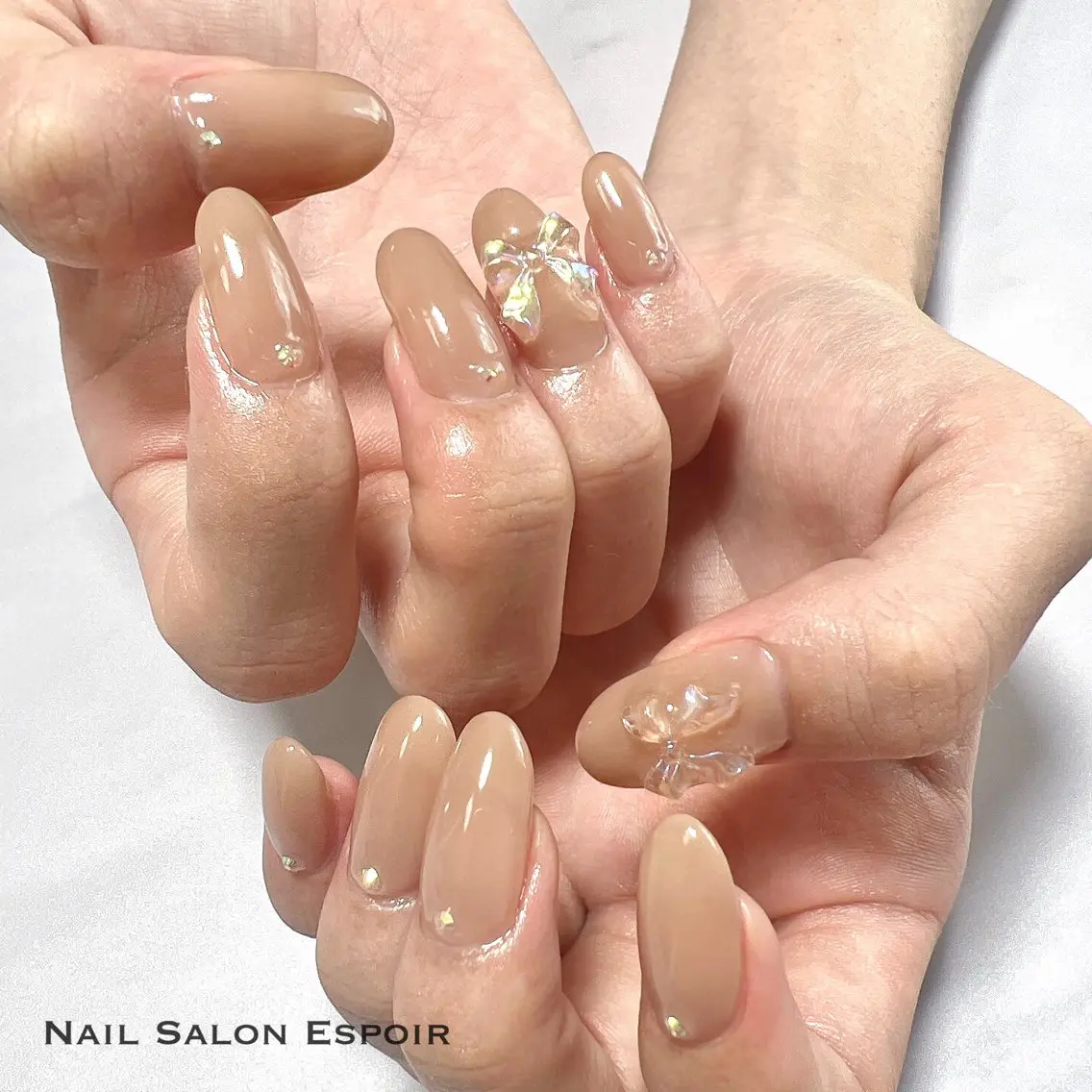 ネイル オーロラネイル リボン Nail Salon Espoirのネイルデザイン