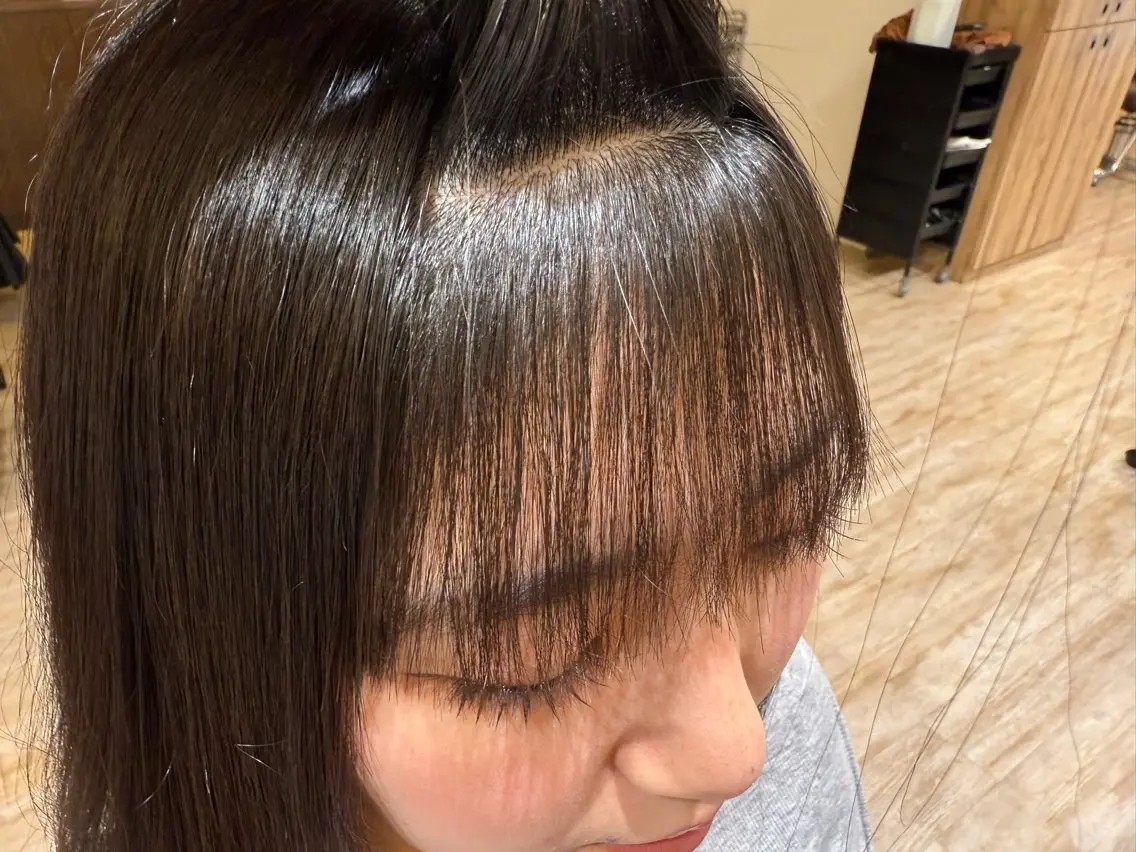 ロング ゆるふわパーマ 似合わせカットのヘアスタイル