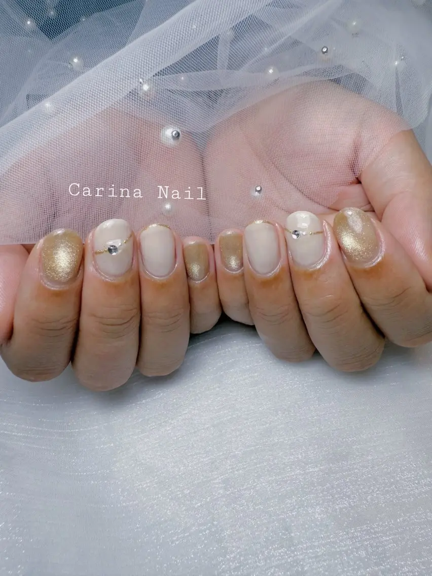 ネイル ゴールド ストーンネイル Carina Nailのネイルデザイン
