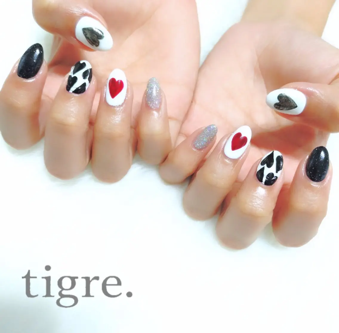 ネイル ハンドネイル tigre .のネイルデザイン