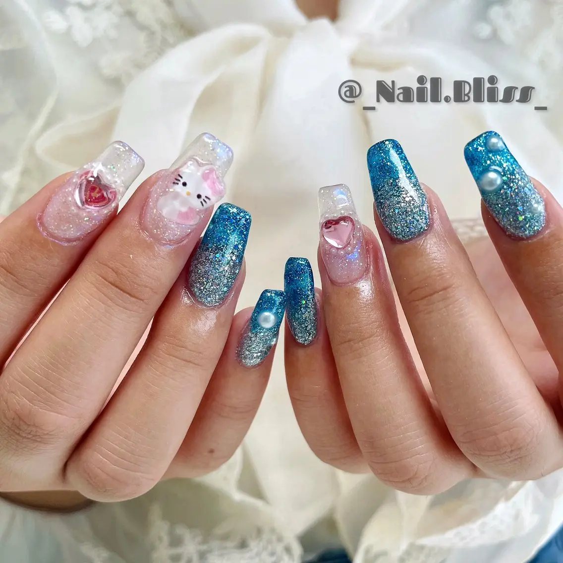 ネイル オーロラネイル ラメ(グリッター) ラメグラデーション ピンク ハンドネイル NAIL BLISSのネイルデザイン