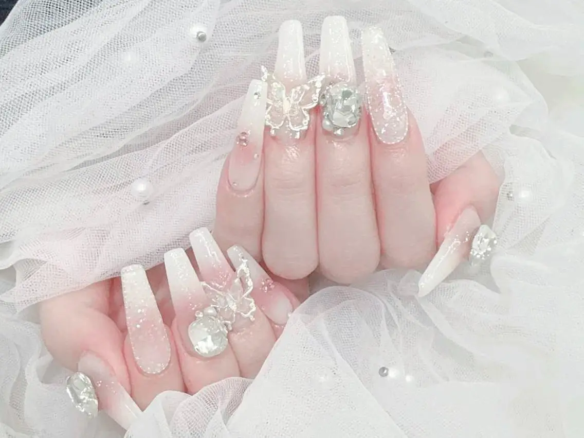 ネイル 成人式 マグネットネイル 大理石ネイル(マーブル) リボン 夏ネイル ハンドネイル MoMoA Nail ネイル長さ出し専門店のネイルデザイン