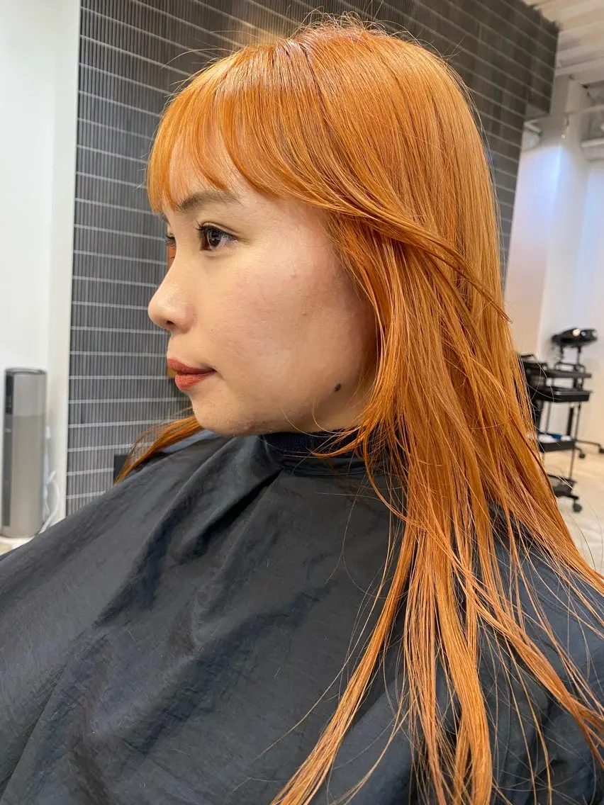 ミディアム カラー ブリーチ オレンジ 永田 愛莉のヘアスタイル