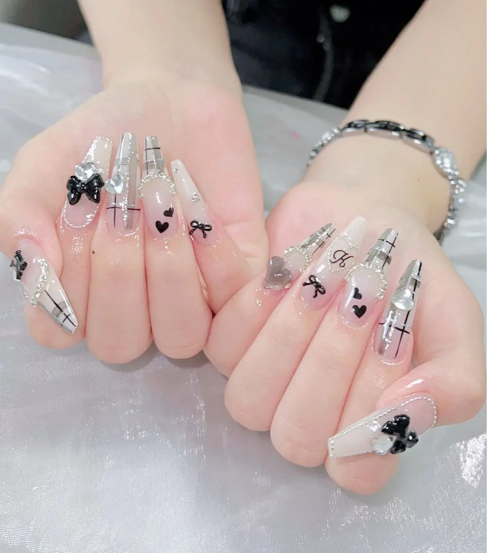 ネイル 成人式 ロングネイル マグネットネイル 大理石ネイル(マーブル) リボン ハンドネイル ZUZU AMEE NAILのネイルデザイン