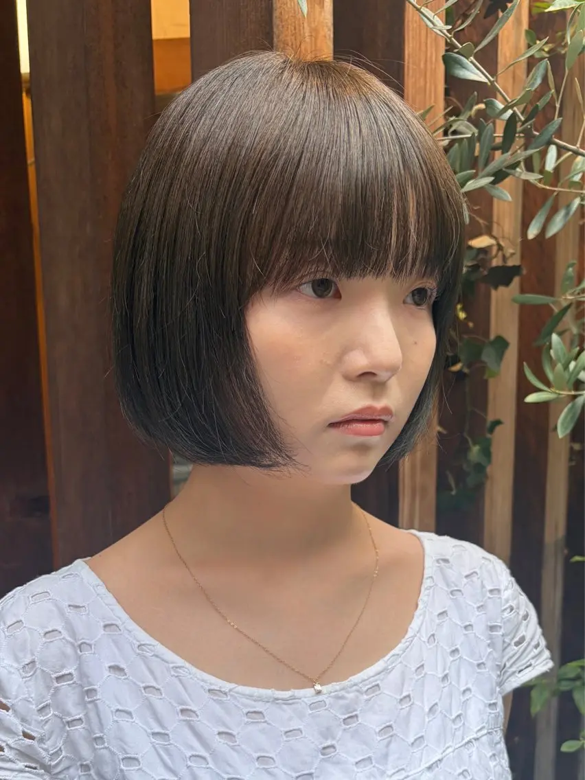 bob cut + one color*･🪷の写真
