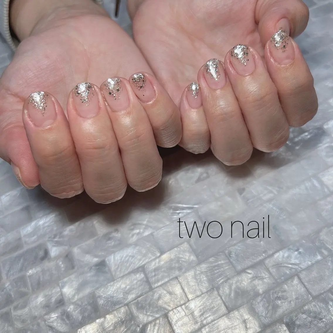 ネイル キラキラネイル ネイルチップ ホワイト ハンドネイル two nailのネイルデザイン