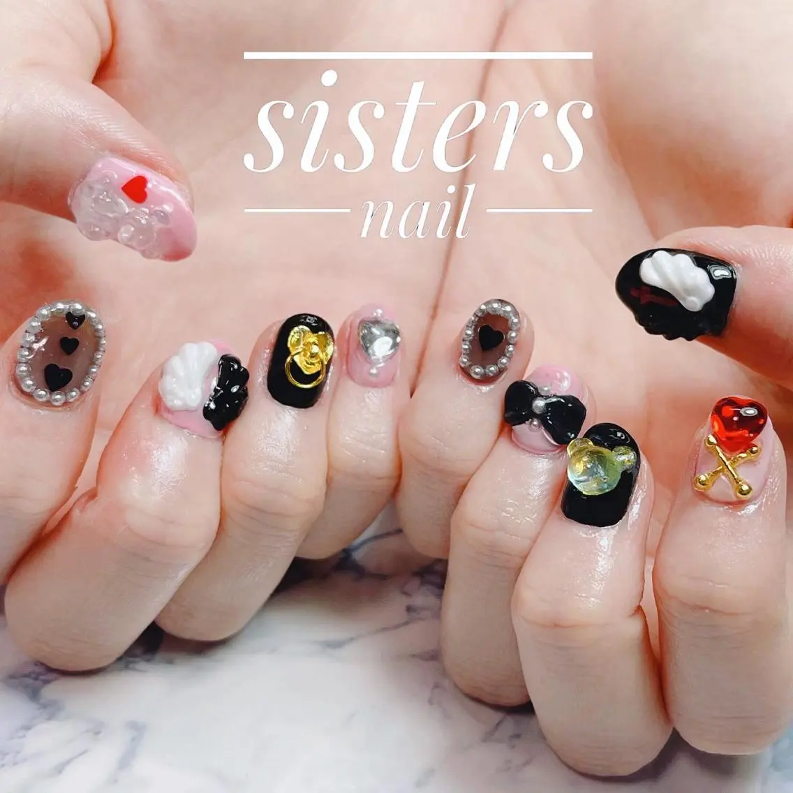 ネイル アートネイル ハート リボン sisters nail.fのネイルデザイン