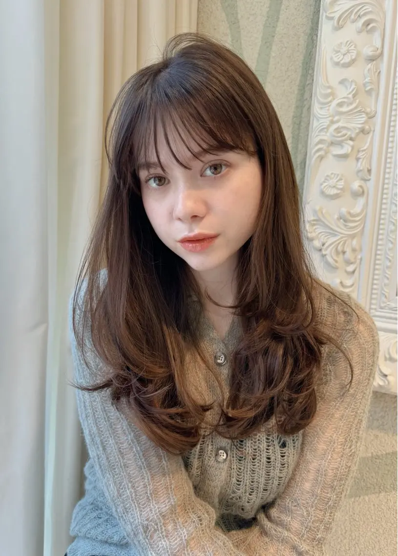 レイヤーカット✂️赤味を打ち消す透明感カラーの写真