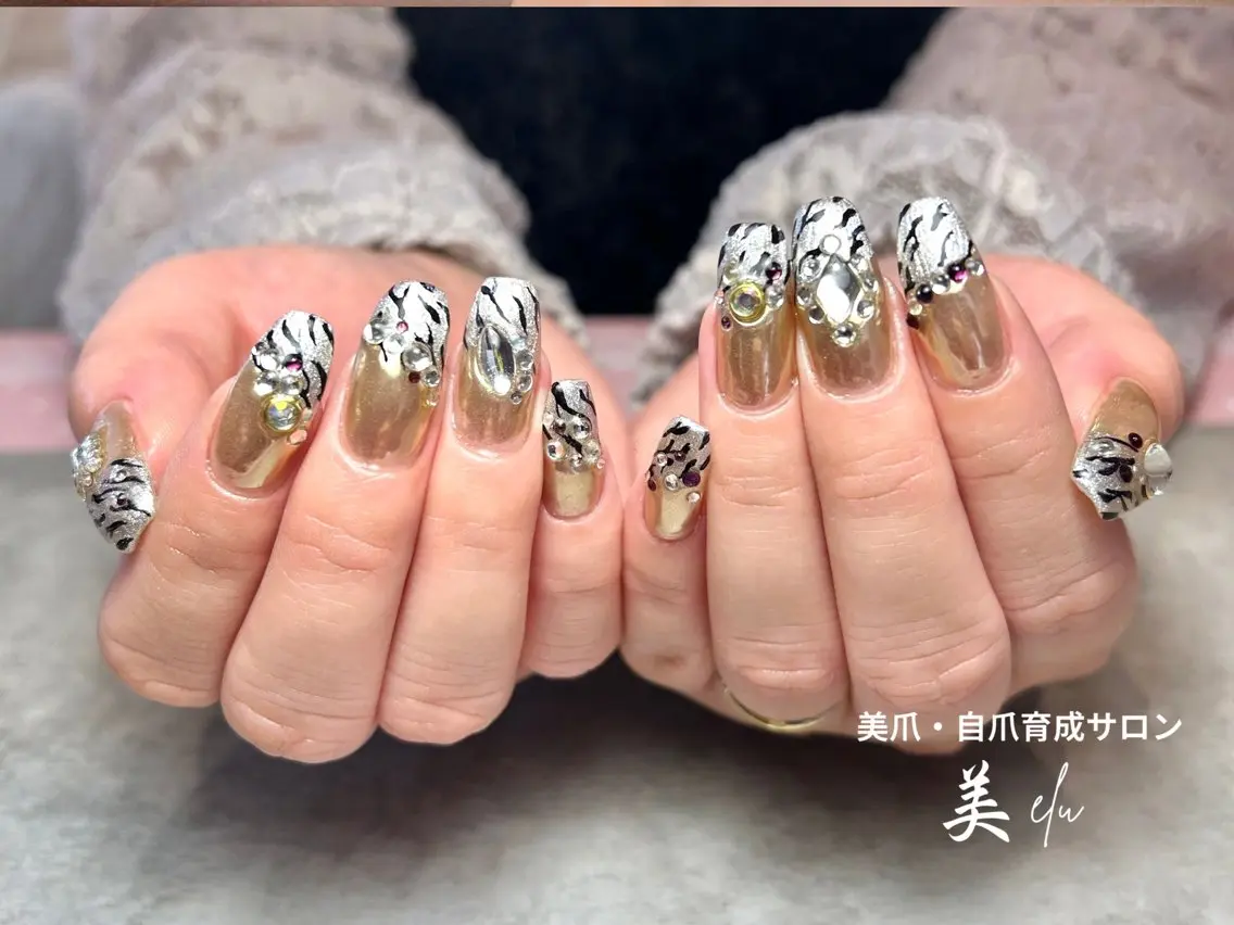 ネイル アニマル柄 キラキラネイル ロングネイル ミラーネイル ハンドネイル 美爪・自爪育成サロン 美elu(ビエル)のネイルデザイン