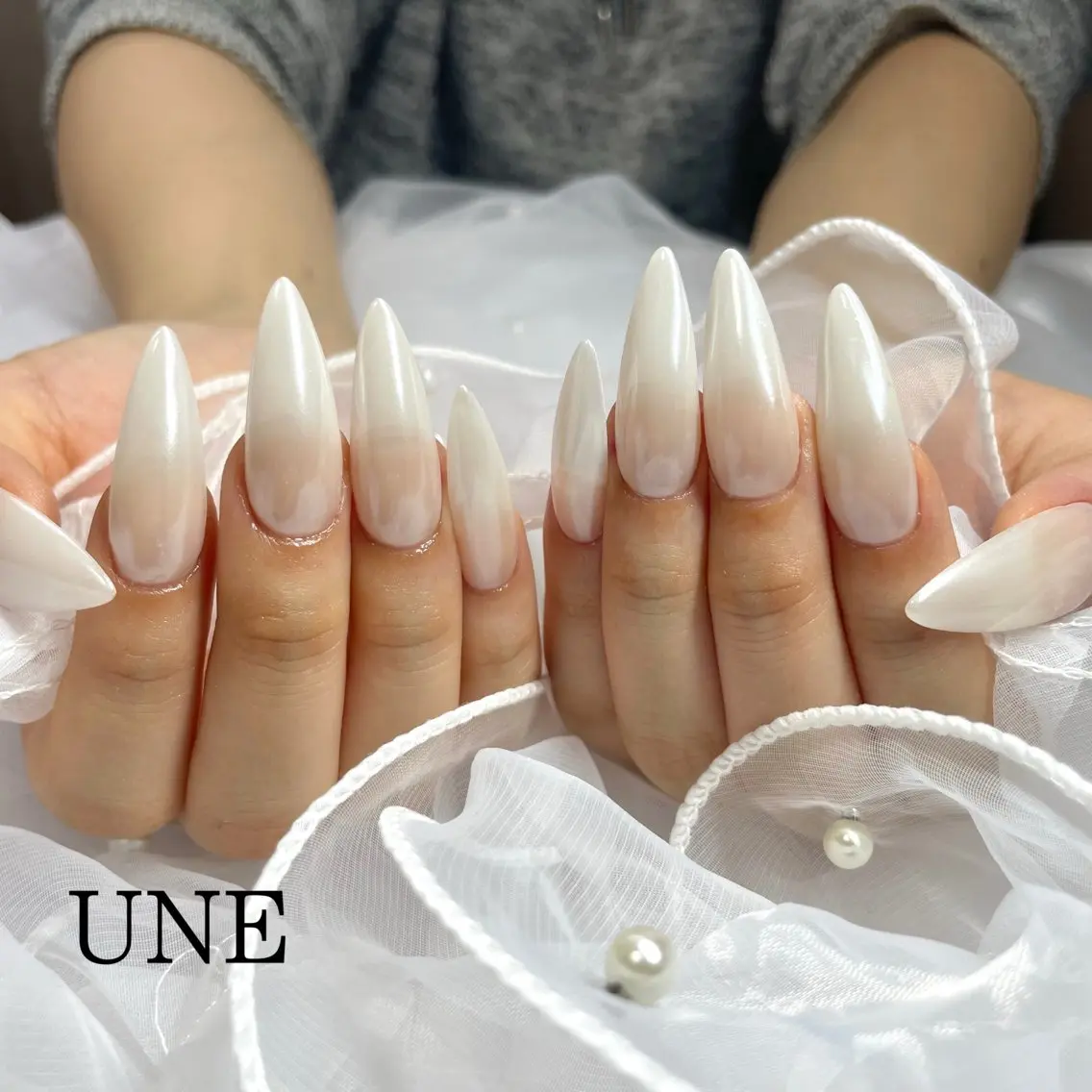 ネイル ホワイト ハンドネイル UNE.【ユヌ】 Jr.NANAのネイルデザイン