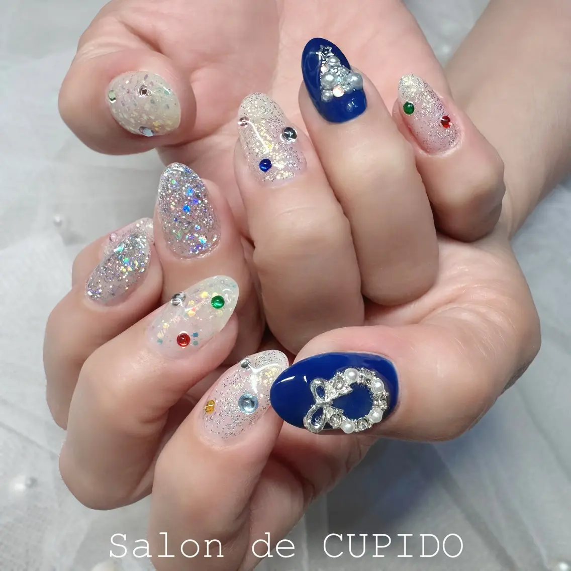 ネイル キラキラネイル ホワイト 冬ネイル クリスマス Salon de CUPIDOのネイルデザイン