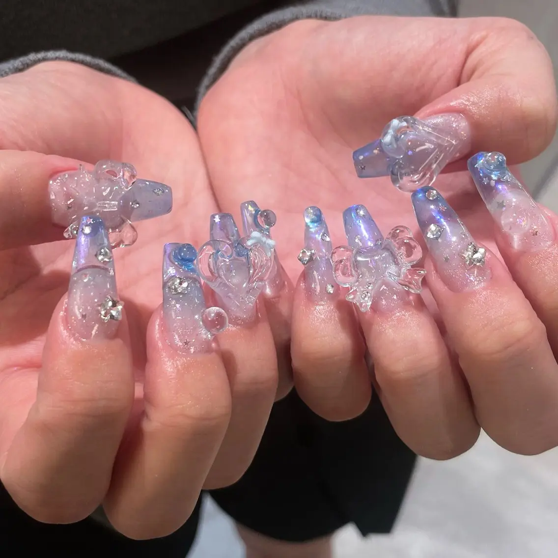 ネイル オーロラネイル クリアネイル グラデーション ハート リボン ハンドネイル ailed'Ange 🍒miuのネイルデザイン