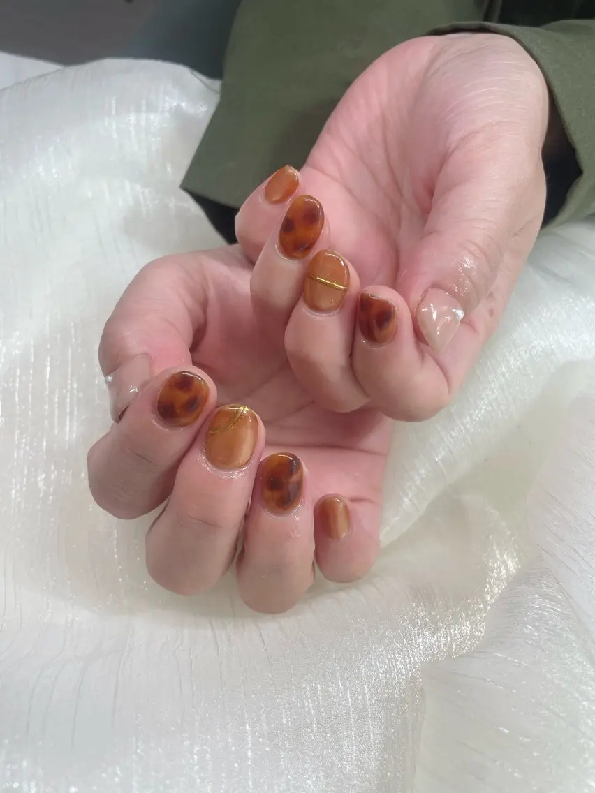 ネイル べっ甲ネイル ハンドネイル Knail COCOA🩵のネイルデザイン