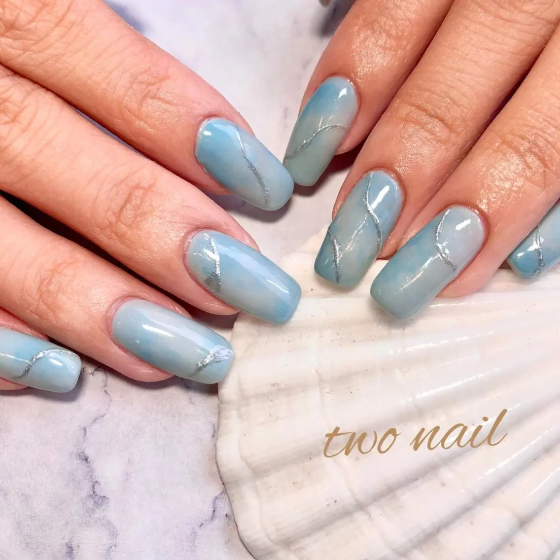 ネイル ブルー フットネイル ハート ニュアンスネイル two nailのネイルデザイン