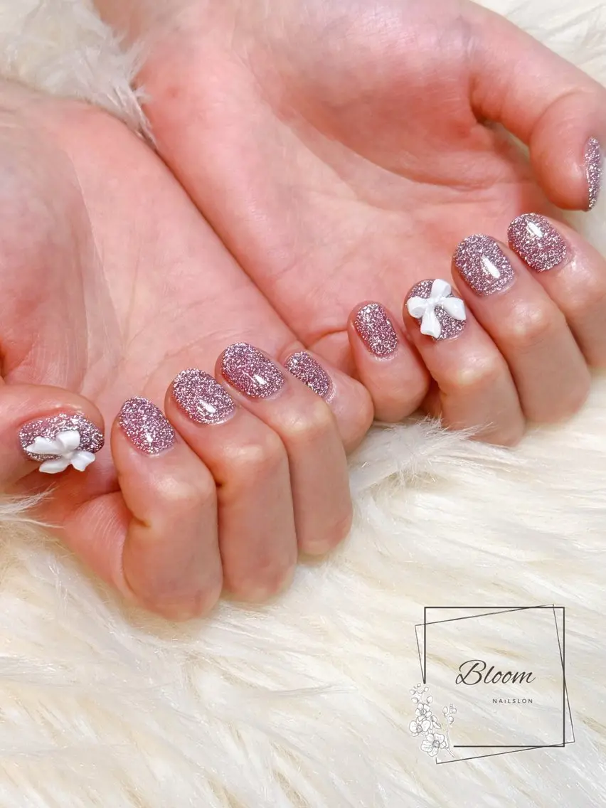 ネイル フラッシュネイル ジェルネイル ピンク リボン Bloom Nail Salonのネイルデザイン