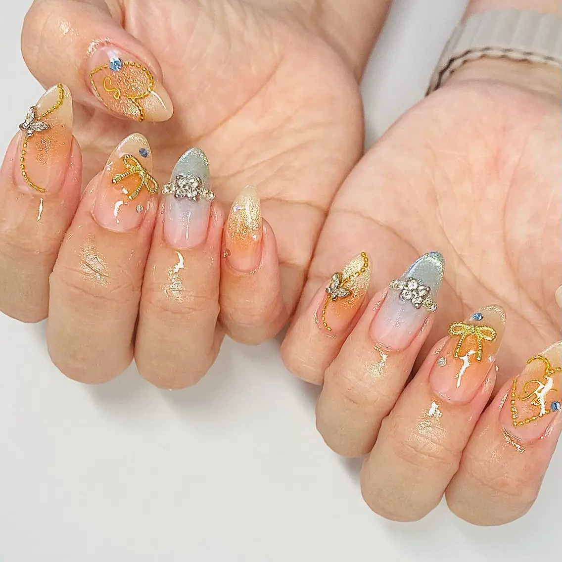 ネイル キラキラネイル オレンジ &U新松戸 スカルプ パラジェルフィルインのネイルデザイン