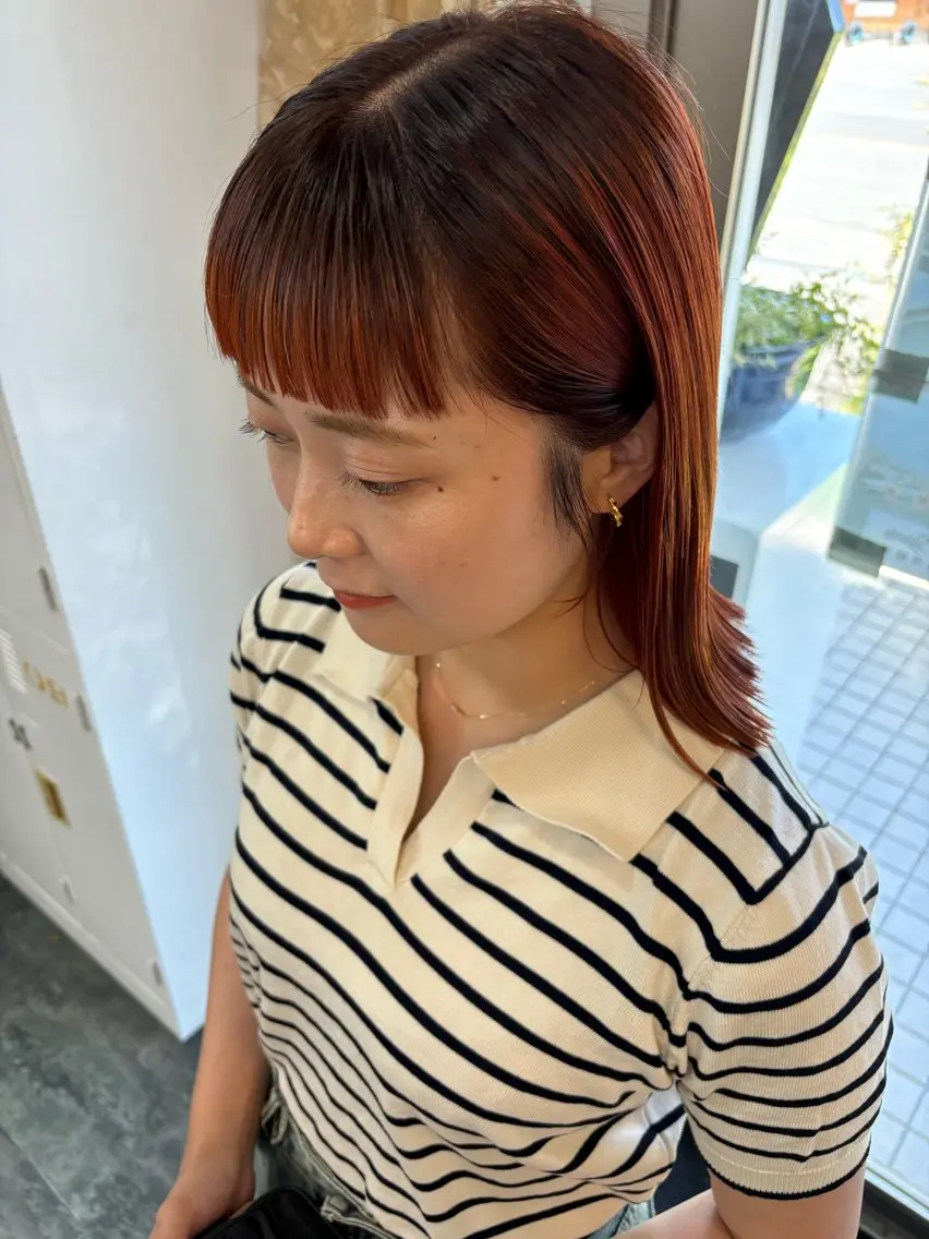 ミディアム カラー オレンジ LOMARLIE JURIAのヘアスタイル
