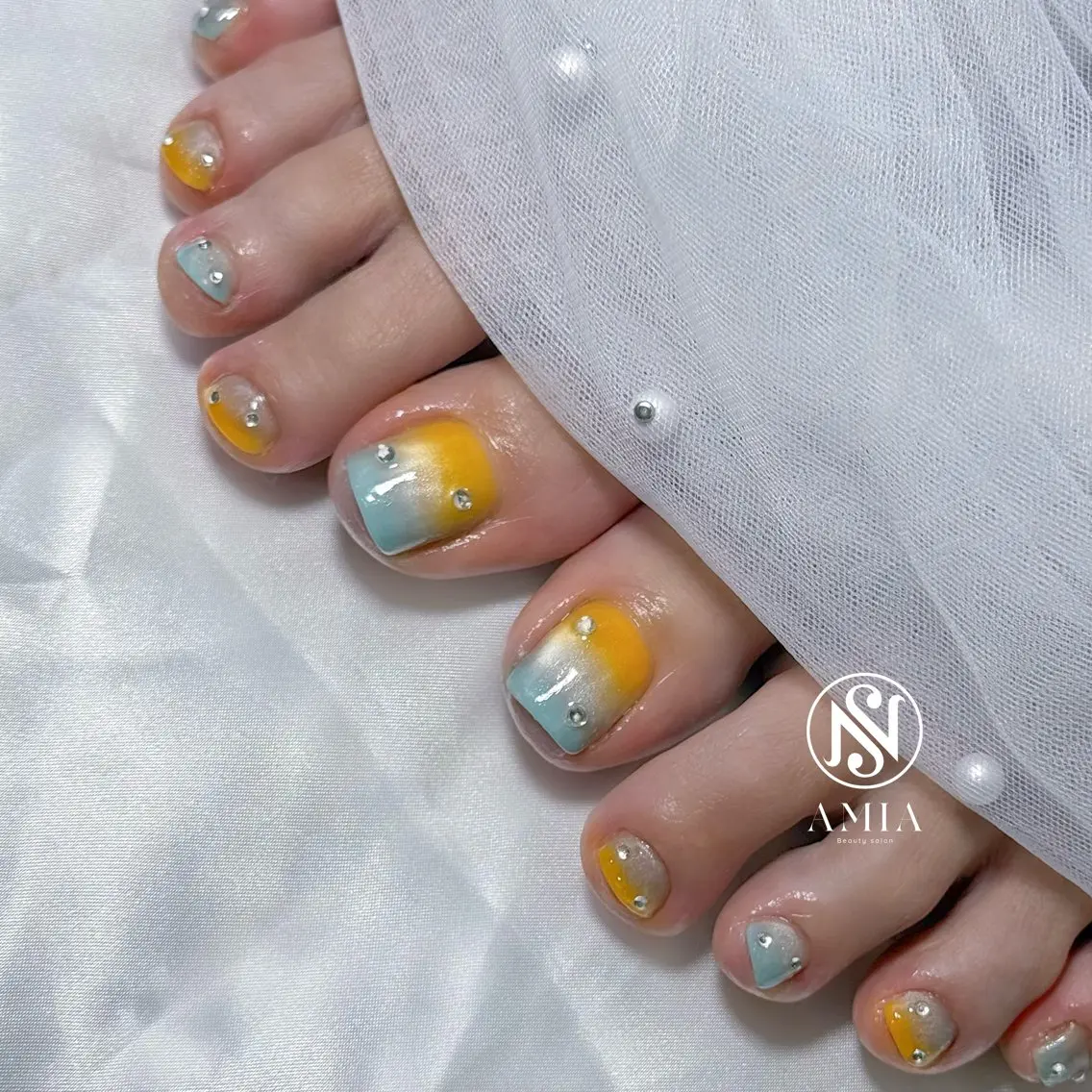 ミディアム フットネイル 🌟AMIA BEAUTY🌟のネイルデザイン