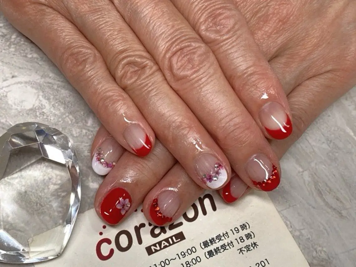 ネイル 桜ネイル フレンチネイル 赤色 ストーンネイル ハンドネイル ハンドケア ネイリスト aicoのネイルデザイン