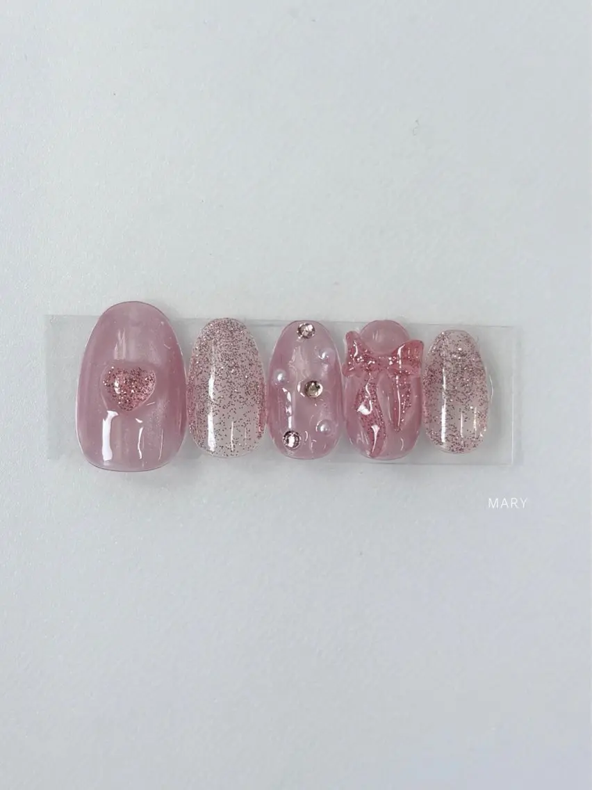 ネイル フラッシュネイル マグネットネイル ピンク リボン 春ネイル ハンドネイル Mary nail .narumiのネイルデザイン
