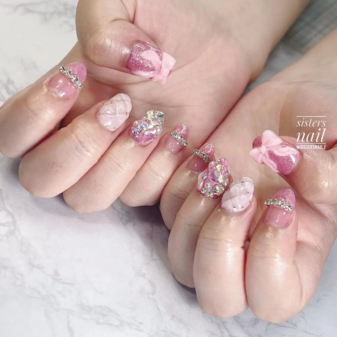 ネイル アートネイル パステルネイル ピンク リボン ストーンネイル sisters nail.fのネイルデザイン