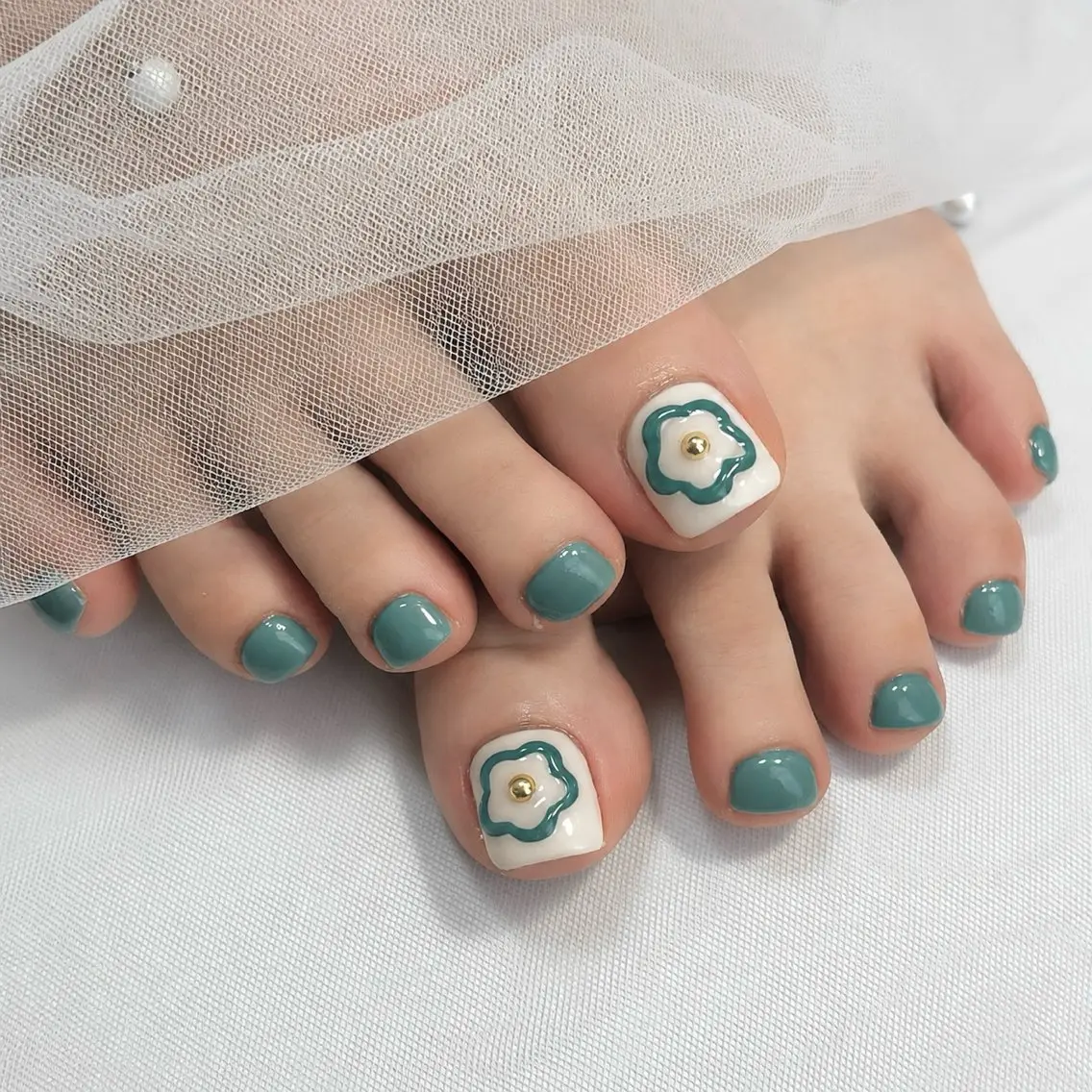 【foot】親指アート🤎(オフ込み)の写真