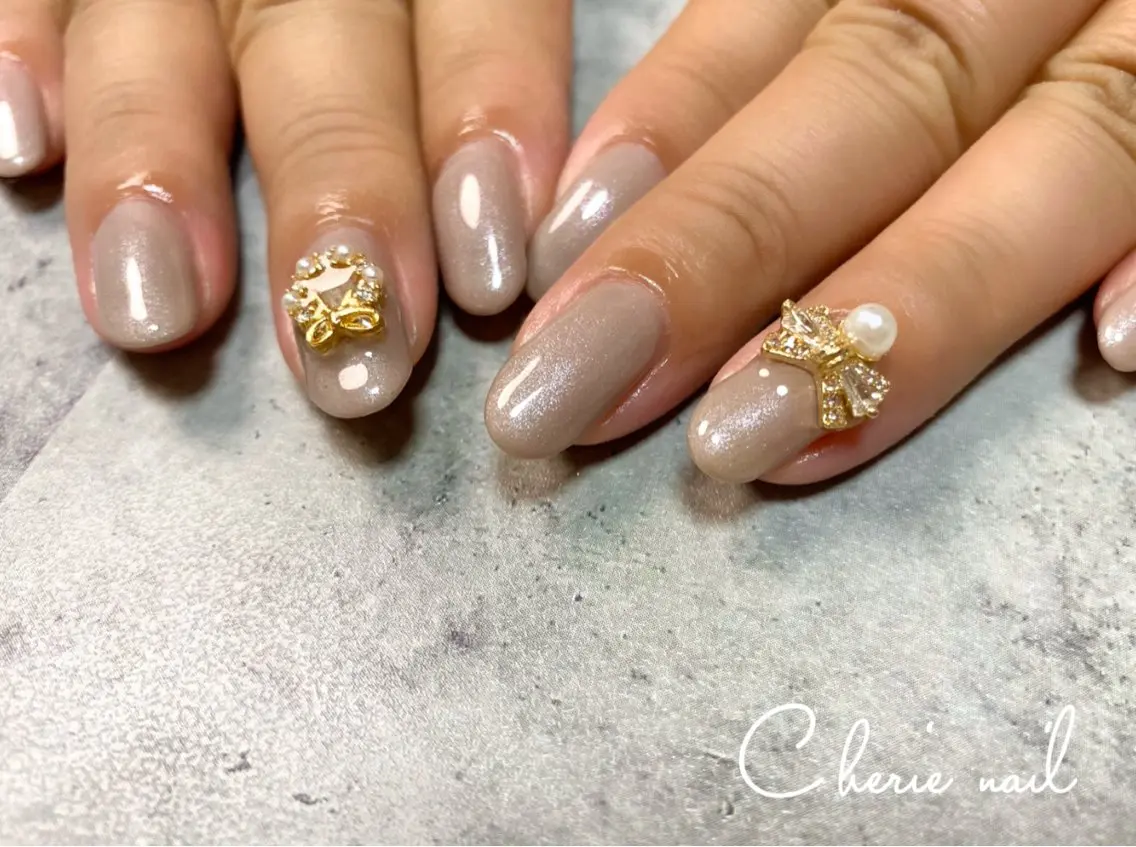 ネイル ジェルネイル ラメ(グリッター) ワンカラーネイル リボン 冬ネイル Cherienail yunaのネイルデザイン