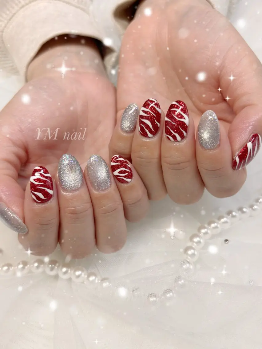 ネイル アニマル柄 キラキラネイル マグネットネイル 赤色 シルバー ハンドネイル YM nailのネイルデザイン