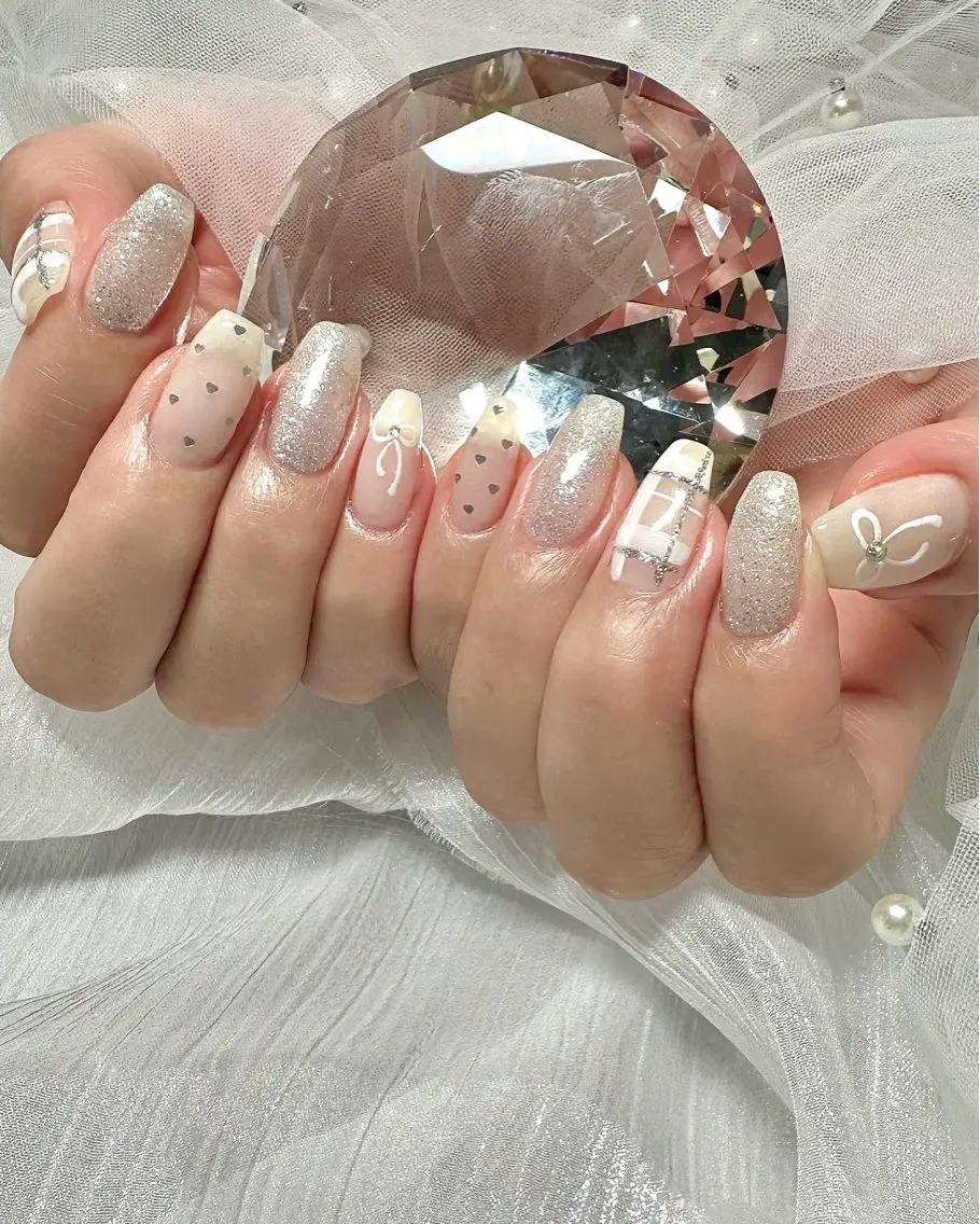 ネイル ハート ホログラムネイル キラキラネイル ラメ(グリッター) リボン Sei | cres nailのネイルデザイン