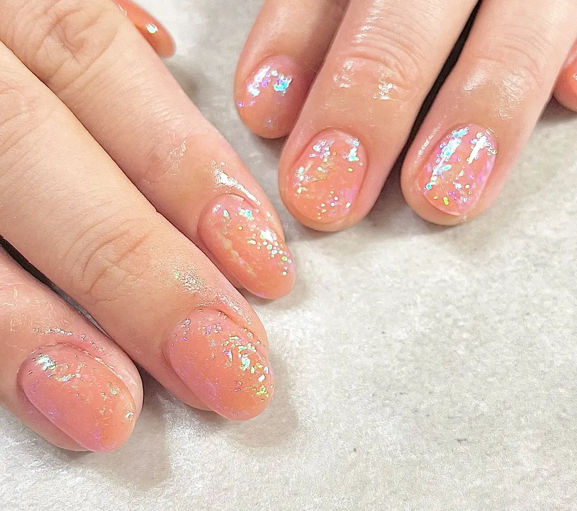 ネイル オーロラネイル ラメ(グリッター) ワンカラーネイル オレンジ ネイルサロン ミールのネイルデザイン