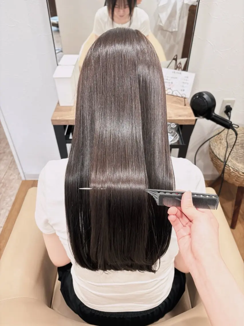 ロング トリートメント un knownのヘアスタイル