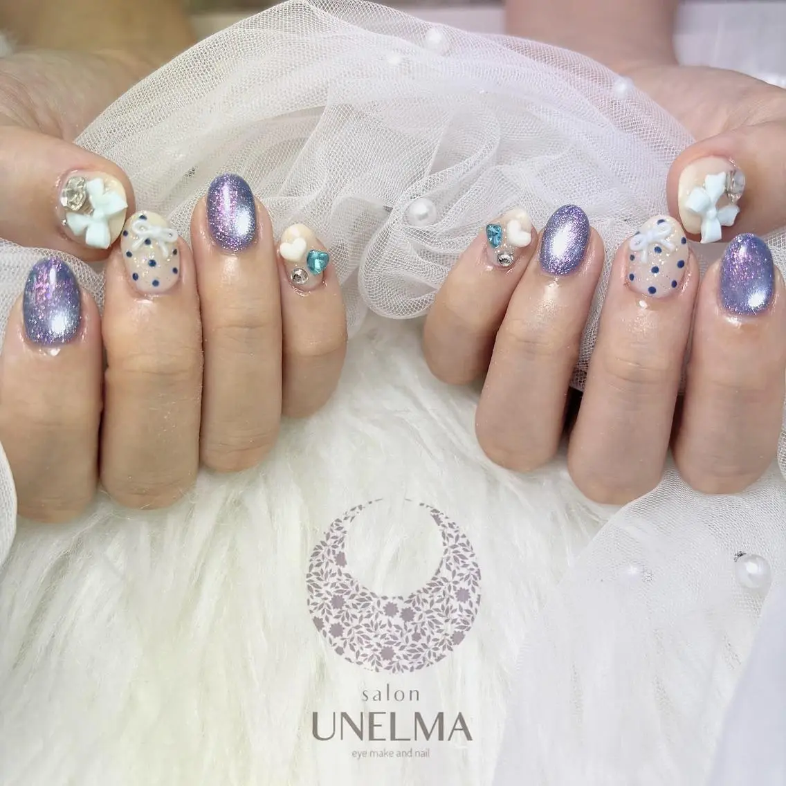 ネイル ブルー ドット ラメ(グリッター) ぷっくりネイル リボン りとるうねるま (UNELMA)のネイルデザイン