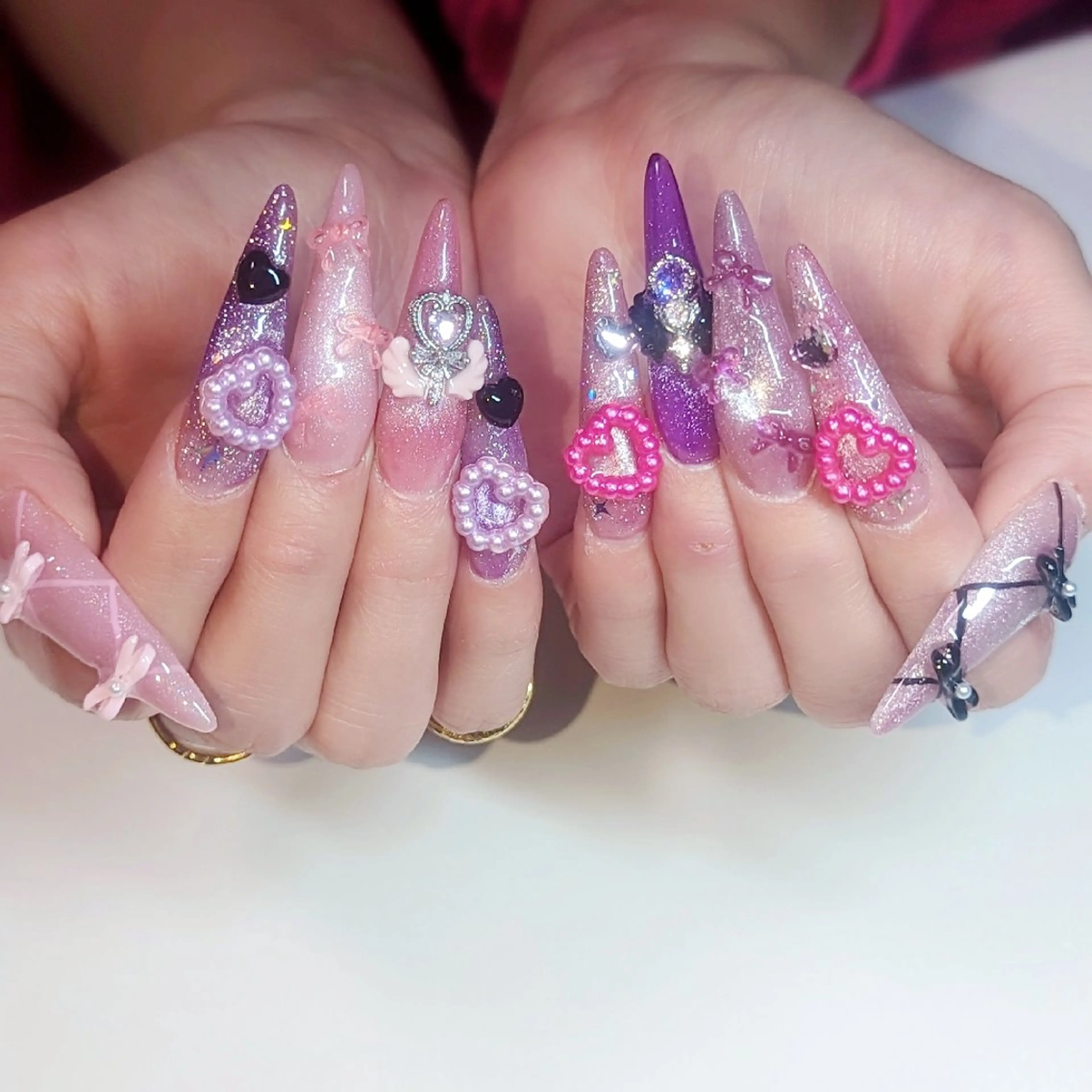 ロング ハンドネイル クロキ 。のネイルデザイン