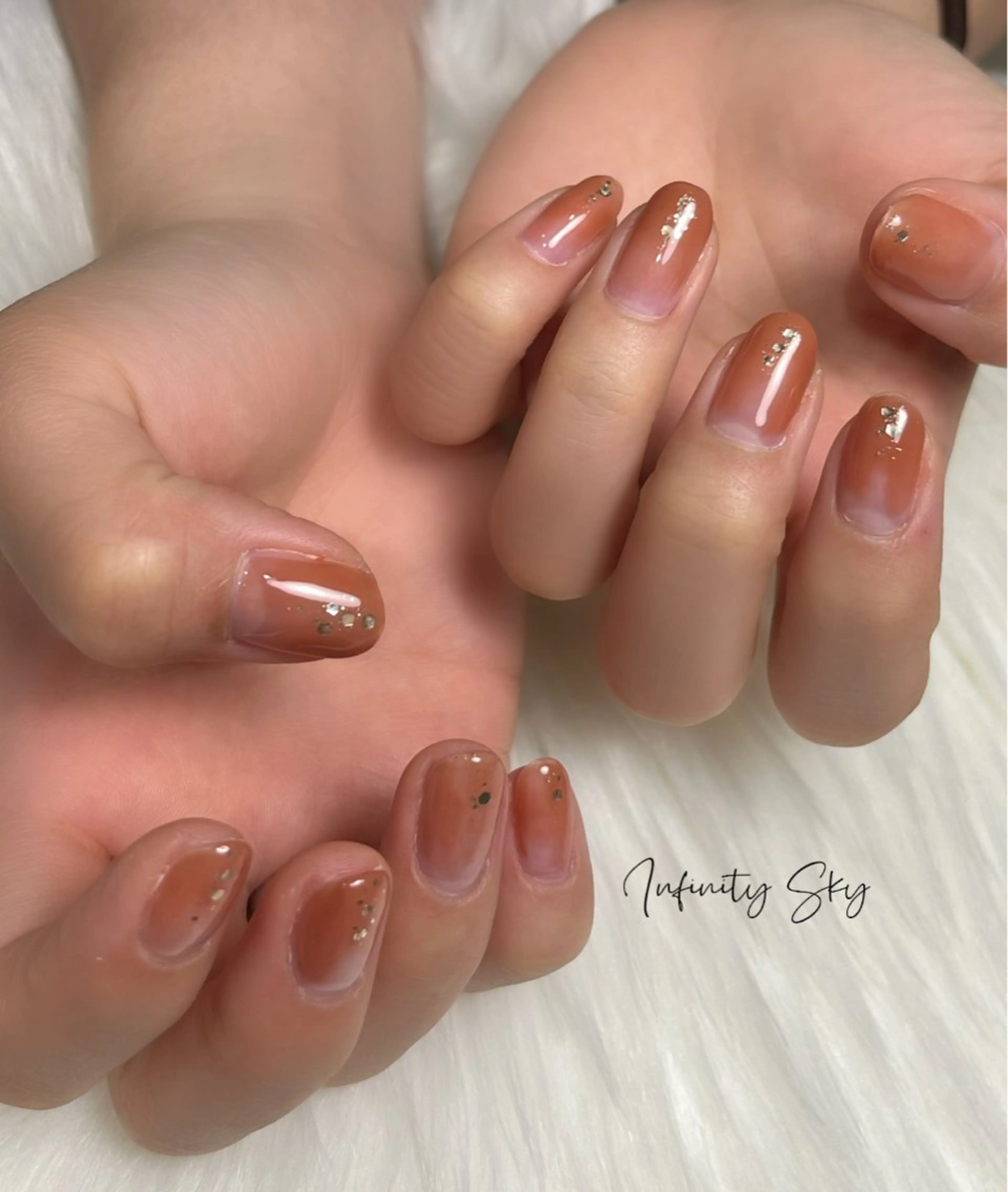 ネイル ブラウン ニュアンスネイル オレンジ シンプルネイル infinity skyのネイルデザイン